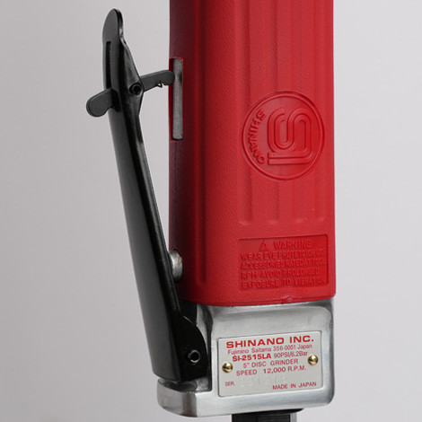 Shinano SI-2515LA 5-inch heavy-duty air angle grinder showing structural side handle, wheel guard, and high-torque motor housing