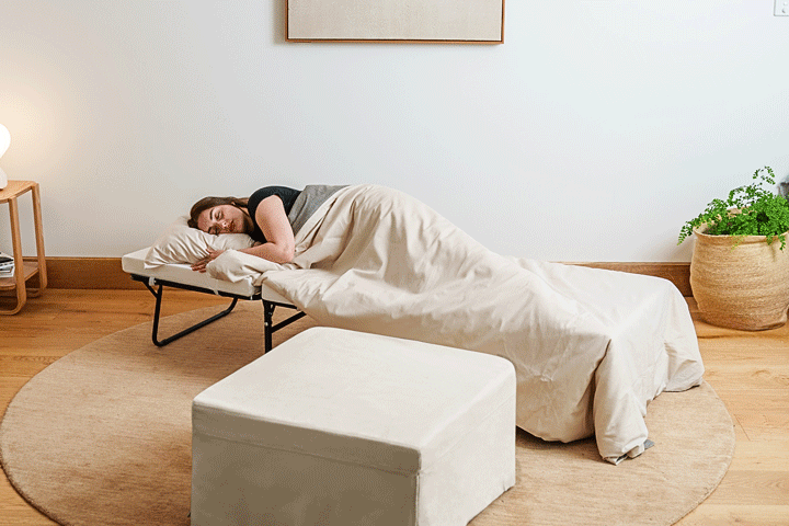 Ottoman folding into bed