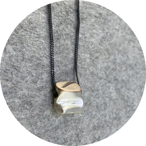 Robyn Clarke- Crushed pendant with rose gold detailing. Fine silver and 9ct rose gold pendant with oxidised sterling silver chain. Robyn Clarke- Crushed pendant with rose gold detailing. Fine silver and 9ct rose gold pendant with oxidised sterling silver chain.