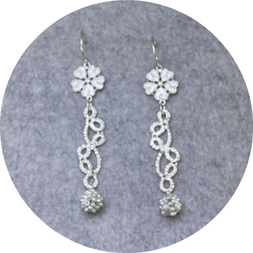 Pamela Camille- Large derry Rose. Tatted leaf and stem with seed pearl cluster bead. Drop earrings in sterling silver. Pamela Camille- Large derry Rose. Tatted leaf and stem with seed pearl cluster bead. Drop earrings in sterling silver.