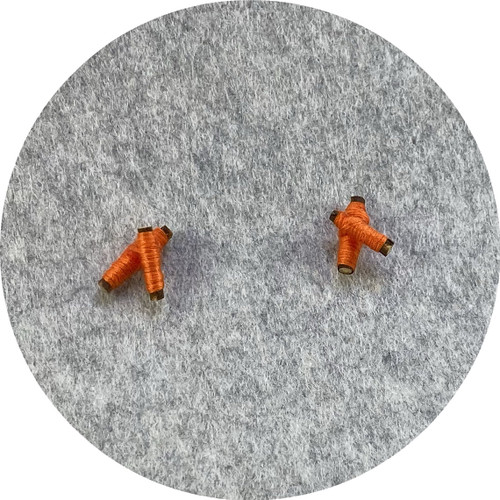 Melissa Gillespie - ‘Wrapped Orange Twig Studs’ made from wood, cotton and sterling silver Melissa Gillespie - ‘Wrapped Orange Twig Studs’ made from wood, cotton and sterling silver