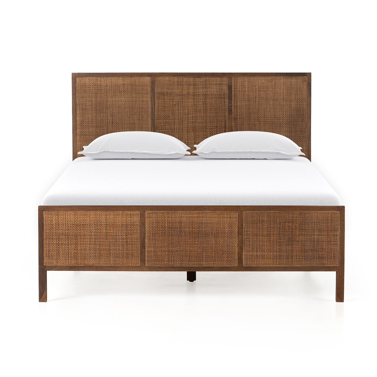 Bondi Woven Cane Bed features a solid natural mango wood frame in a brown wash finish contrasting with inlaid natural woven cane for a coastal contemporary inspired style bedroom.
