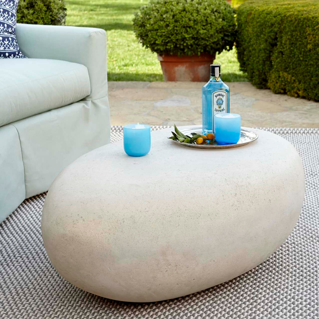 https://cdn11.bigcommerce.com/s-mzridzi69i/images/stencil/1280x1280/products/2458/55923/River_Stone_Outdoor_Coffee_Table__59287.1669509089.jpg?c=2