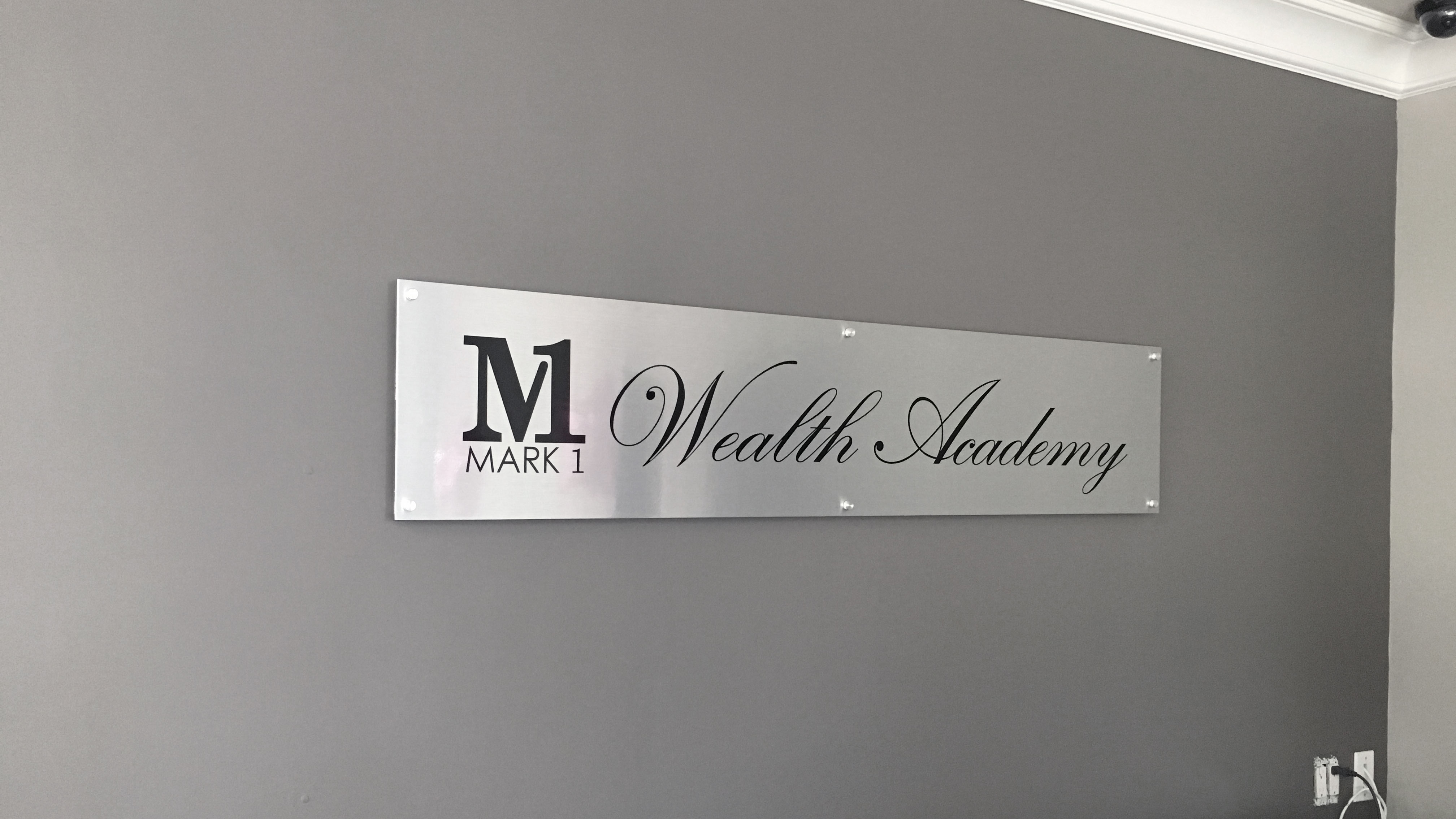 mark1wealthacademylobbysignwebsite.jpg