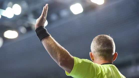 Referee raising hand
