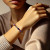 beryl and amethyst bracelet on lady's hand