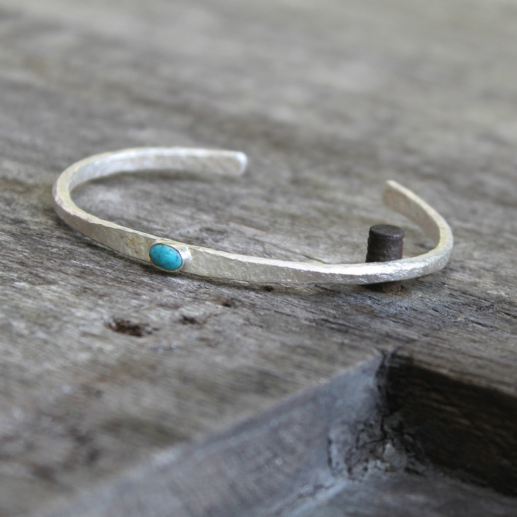 Silver thin cuff with turquoise inset stone