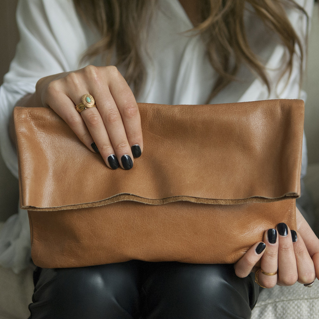 caramel coloured brown fold over clutch with zipper