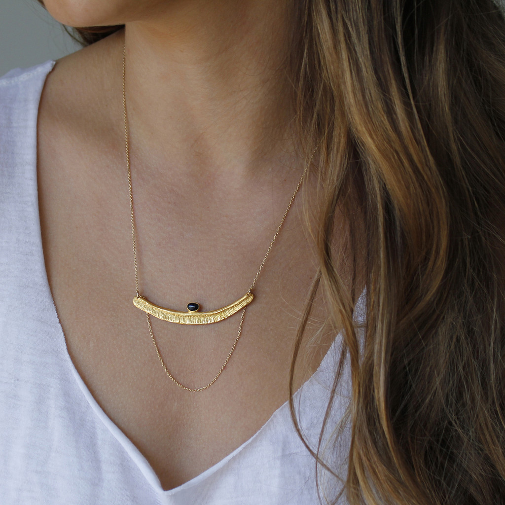 Textured bar with black onyx stone detailing and multi-length gold-filled chain