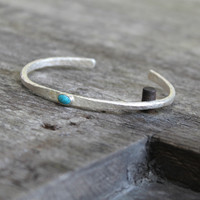 Silver thin cuff with turquoise inset stone