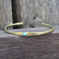 Brass thin cuff with turquoise inset stone