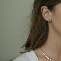 brass earrings with turquoise stone detailing 