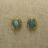 brass earrings with turquoise stone detailing 