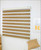 Zebra Basic Dual Sheer Light Filtering Roller Shades Woodlook Brown Color in studio

Natural Elegance: Enhance the aesthetic appeal of your studio with Zebra Basic Dual Sheer Light Filtering Roller Shades in Woodlook Brown color. The warm and natural tones of the brown shade create a cozy and inviting atmosphere.
Light Filtering Benefits: Experience the beauty of filtered natural light in your studio space. The dual sheer fabric gently diffuses sunlight, reducing glare and creating a soft and pleasant ambiance.
Versatile Light Control: Enjoy the flexibility to adjust the shades to your desired level of light control and privacy. With the easy-to-use controls, you can effortlessly create the perfect setting for any activity in your studio.
Stylish and Functional: The Woodlook Brown color adds a touch of sophistication and blends seamlessly with various interior styles. The shades not only enhance the visual appeal but also offer practical light filtering benefits.
Easy Maintenance: These roller shades are designed for convenience and durability. They are easy to clean and maintain, making them a practical choice for a busy studio environment.