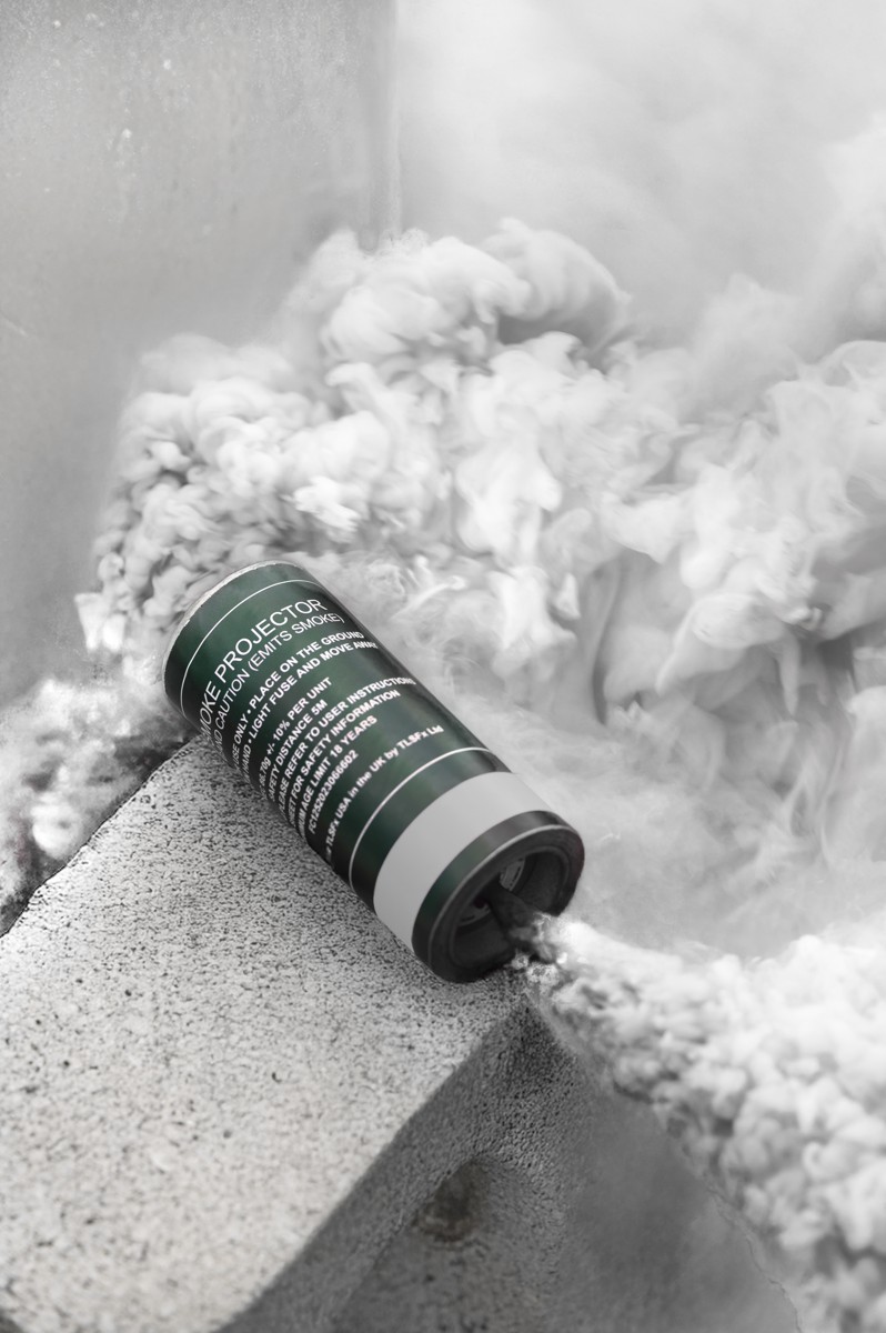 SP45 smoke grenade in white smoke