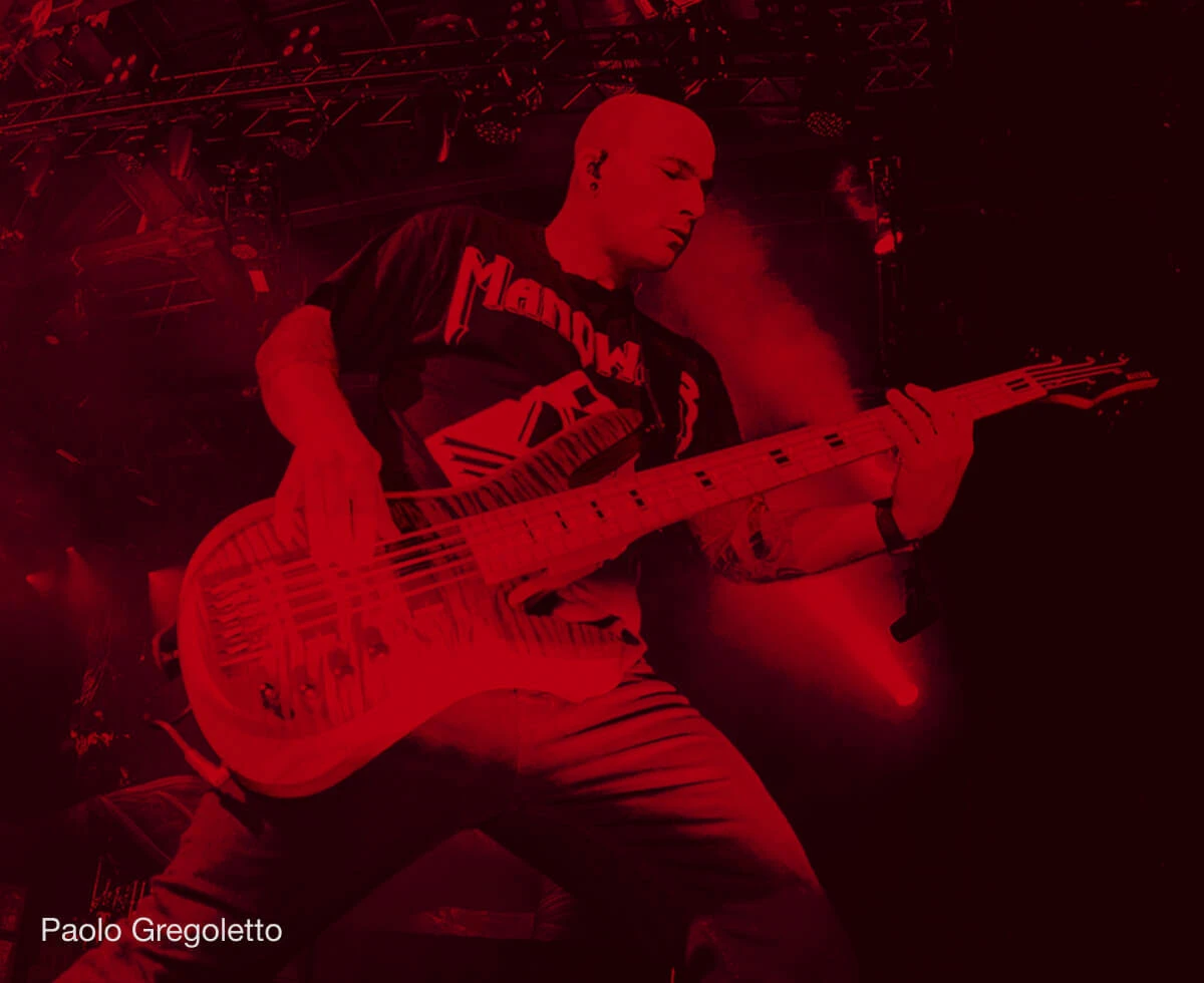 Bassist Paolo Gregoletto performing live with a bass.