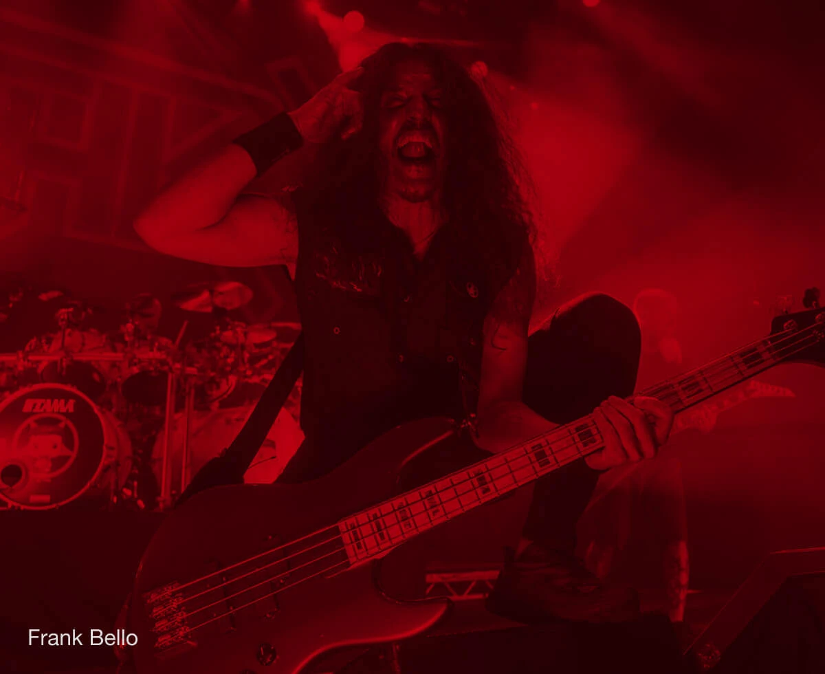 Bassist Frank Bello performing with a bass.