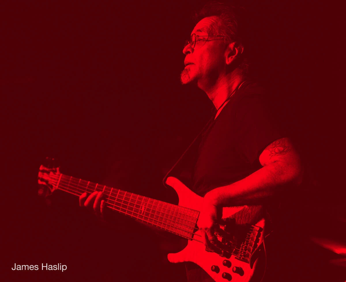 Bassist James Haslip performing with a bass.