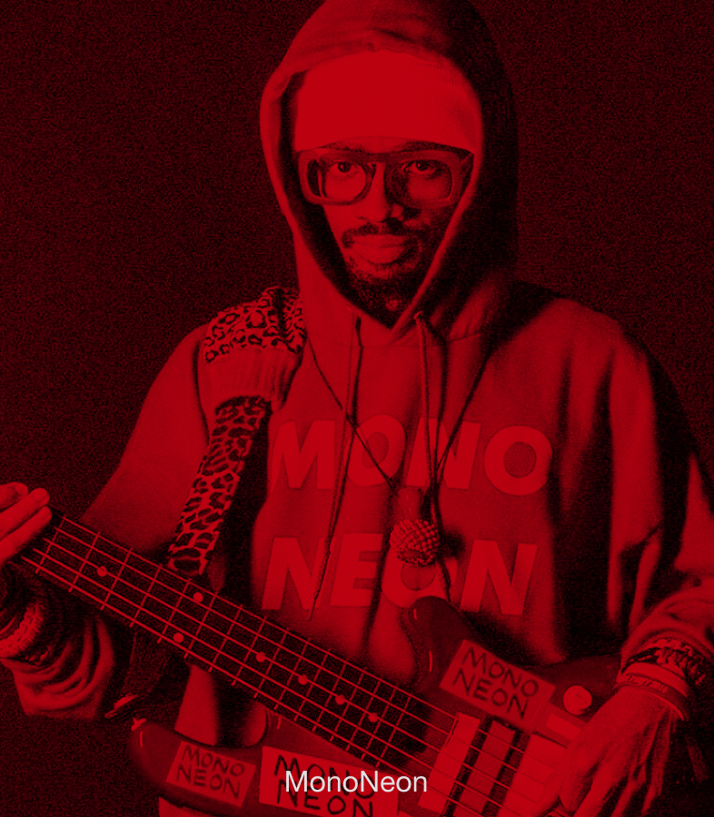 Bassist MonoNeon performing with a bass.