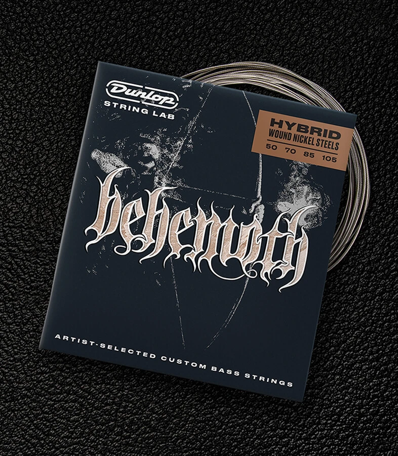 A Dunlop bass string package with the coiled strings fanned out beside it.