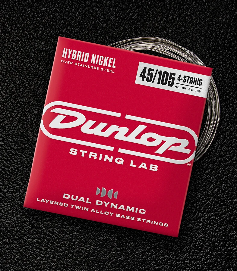 A Dunlop bass string package with the coiled strings fanned out beside it.