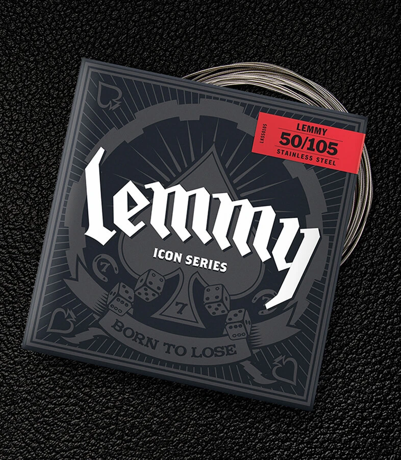 A Dunlop bass string package with the coiled strings fanned out beside it.