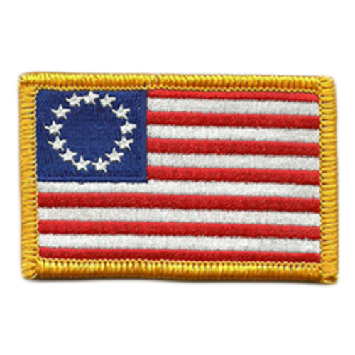 Betsy Ross American flag patch with embroidered stars, stripes and gold stitched border.
