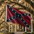Vintage Confederate battle flag displayed outdoors on a building