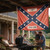 I Ain't Coming Down Confederate Flag displayed on a building