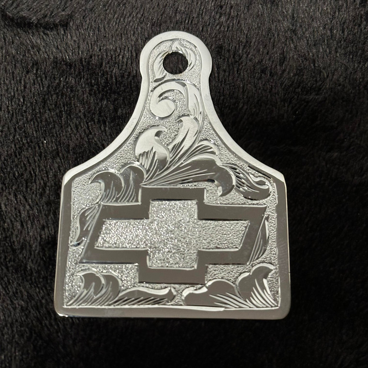 Chrome plated. <br>
Each piece is hand engraved and has a unique design variation.<br>
No two pieces are the exactly alike.<br>