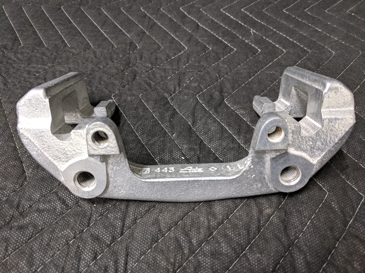 BMW E36 3-Series Front Brake Caliper Carrier 34106758104