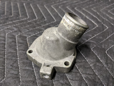BMW E30 3-Series Engine Thermostat Cover M20 1265058 BMW E30 3-Series Engine Thermostat Cover M20 1265058