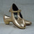 Peggy Gold T-Strap Shoe  Peggy Gold T-Strap Shoe