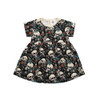 Girls dress with a garden skull print design, combining floral and skull details.