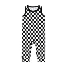 black and white checkerboard baby romper with popper fastenings