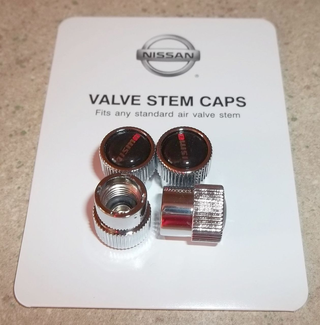 Set Of 4 Nismo Logo Tire Valve Stem Caps 999mb Ax000 Vintage Datsun And Nissan Parts