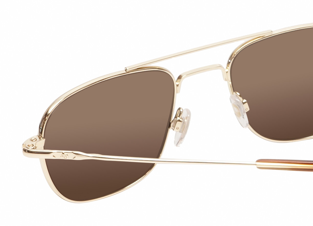 Close Up View of American Optical Checkmate Unisex Pilot Sunglasses in Gold/Polarized Brown 56 mm
