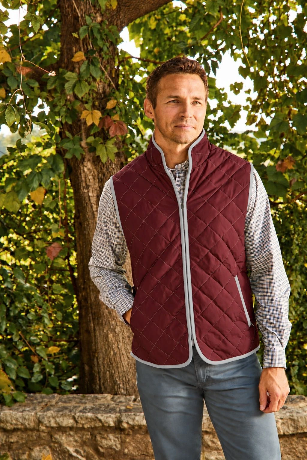 Man wearing a maroon Horn Legend quilted vest