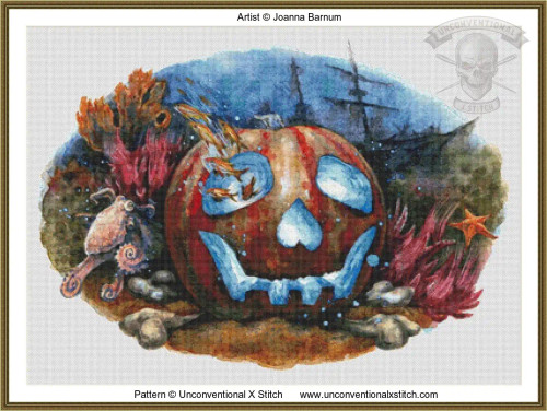 Cross stitch pattern of an underwater scene with a jack-o lantern pumpkin among coral, starfish, octopus, fish, and a shipwreck in the background