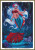 Cross-stitch pattern of a colourful mermaid with striking white hair adorned with red flowers, set against a dark underwater backdrop. The mermaid's tail is a shimmering blend of teal and red, fanning out in fluid shapes. She wears a red bra and has a tattoo of a skull on her left side. Surrounding her are bubbles that give the impression of movement and depth. In the lower right corner, several skulls lie on the ocean floor, adding a mysterious and slightly eerie element to the composition. The background is dominated by deep blue tones, suggesting an oceanic environment with subtle plant-like shapes.