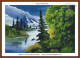 cross stitch pattern of a landscape with snow capped mountain evergreen trees and a calm body of water with a mysterious loch monster