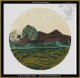  cross stitch pattern of an otter holding a blue green glass float while floating on its back in green water with seaweed