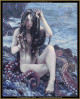 cross stitch pattern of a siren on rocks with tentacles around her