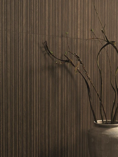 Close up of Circles Wenge 3D Slats Porcelain Tile