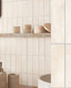 Sophisticated modern kitchen featuring Biscuit Almond Stacked Brick effect tile