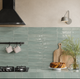 Kitchen backsplash featuring Marrakech Seawater 2x8 subway tile