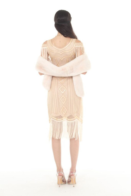 Beige flapper dress with cutout sleeveless fringe.
