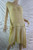 TRENERY yellow beige textured semi-sheer handkerchief dress size 12 EUC front view