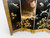 Vintage English fox hunt black lacquered four-panel folding screen room divider close up bottom lift side view