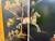 Vintage English fox hunt black lacquered four-panel folding screen room divider close up middle view